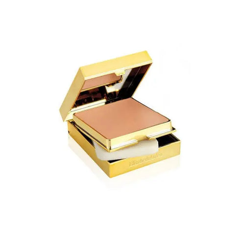 Elizabeth Arden Flawless Finish Sponge-On Cream Makeup in Perfect Beige displayed on a makeup sponge.