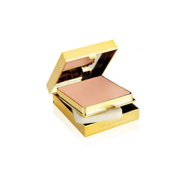 Elizabeth Arden Flawless Finish Sponge-On Cream Makeup in Porcelain Beige, with a beige applicator sponge, on a neutral background.