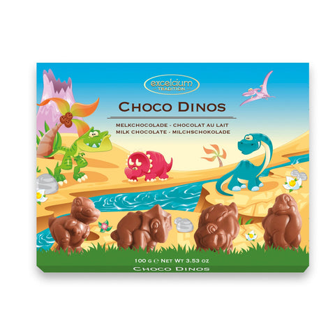 Jag Couture London - New York Excelcium solid milk chocolate dinosaur pieces in a carton, showcasing detailed chocolate dinosaur shapes.