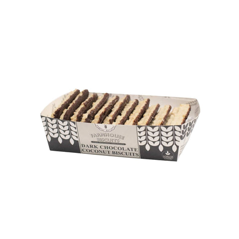 Farmhouse dark chocolate coconut biscuits in a tray by Jag Couture London New York, showcasing rich chocolate and coconut flavor.