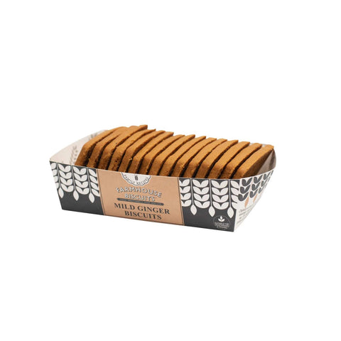 Farmhouse mild ginger biscuits in a tray by Jag Couture London - New York, showcasing golden baked ginger cookies.
