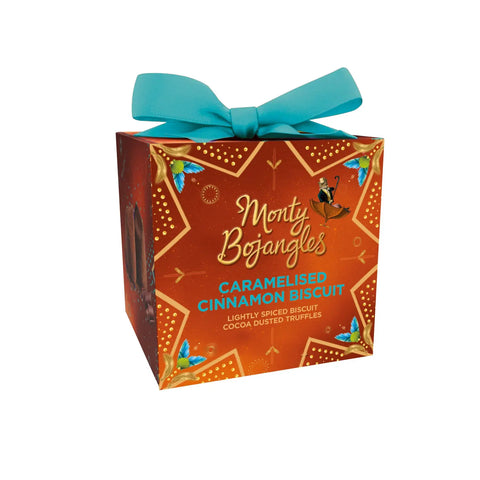 Festively enchanting gift box of caramelized cinnamon biscuit cocoa-dusted truffles by Jag Couture London - New York.