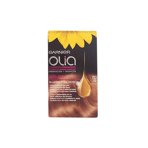 Garnier Olia permanent hair color in shade 7.0 Blond, displayed with packaging from Jag Couture London New York, close-up shot