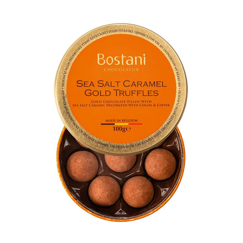 Gift tin of Jag Couture London sea salt caramel gold chocolate truffles rolled in cocoa and coffee powder, 11 x 3.6cm.