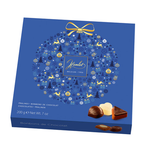 Hamlet blue carton of assorted pralines with bauble design by Jag Couture London New York, featuring elegant packaging and colorful chocolates.