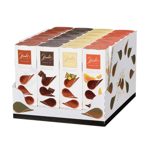 Assorted Jag Couture London Hamlet chocolate thins in milk, dark, milk nut, and dark orange flavors displayed on a plate.