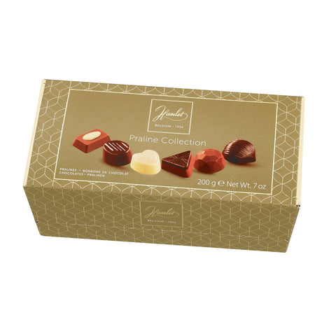 Assorted chocolates from Jag Couture London-New York's Hamlet Praline Collection in a gold ballotin box.
