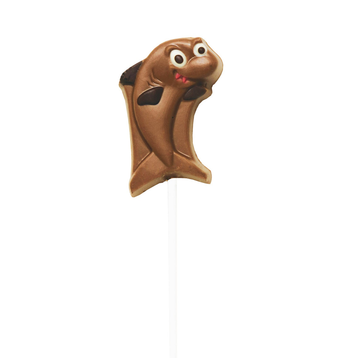 Hand-decorated chocolate shark lollipops in display by Jag Couture London - New York, featuring detailed shark designs.