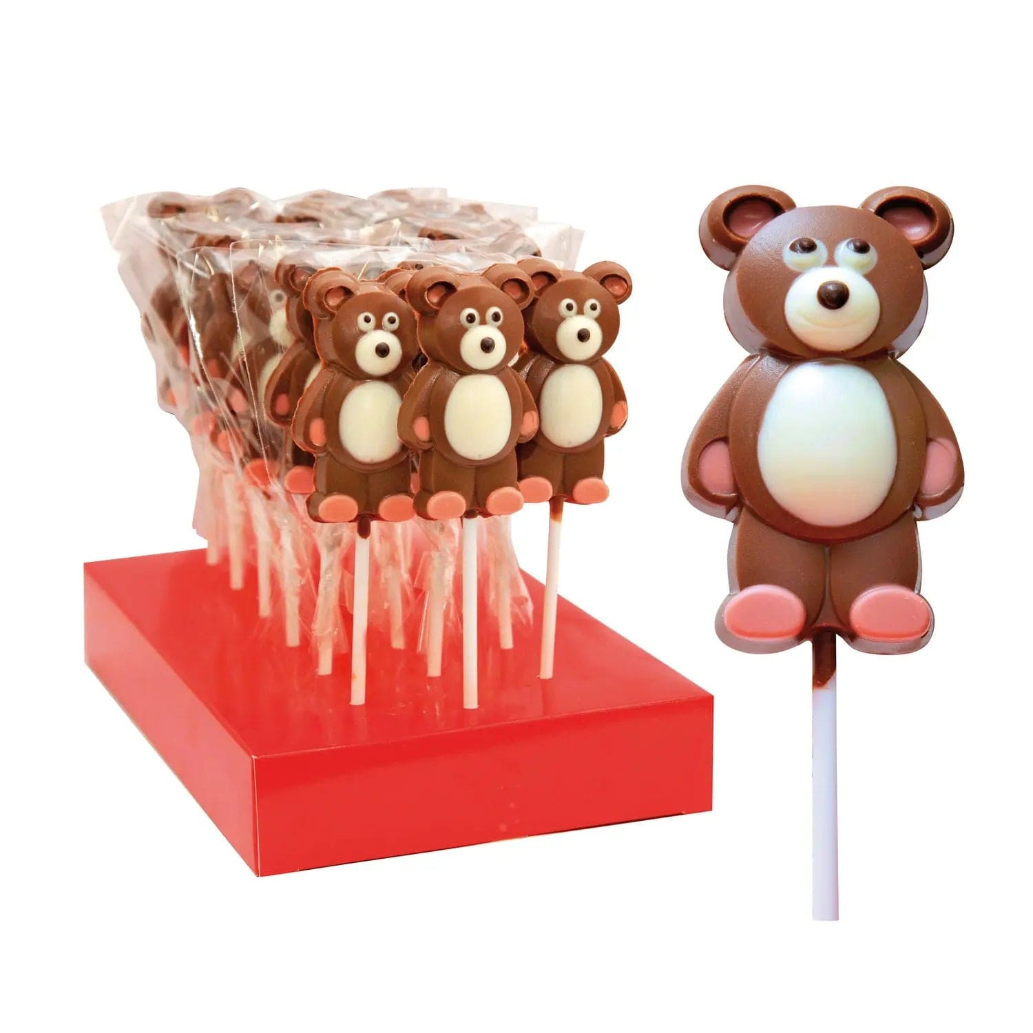 Hand-decorated chocolate teddy bear lollipops displayed together, featuring colorful designs from Jag Couture London - New York.