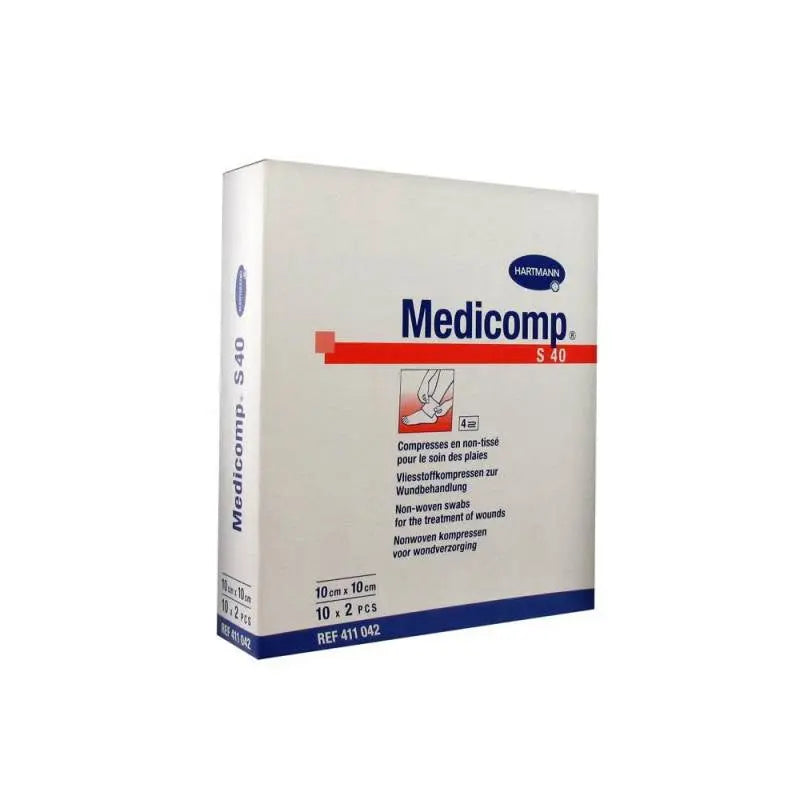 Sterile gauze pads by Hartmann Medicomp, 10x10cm, in a pack of 10, displayed on a medical tray with bandages.