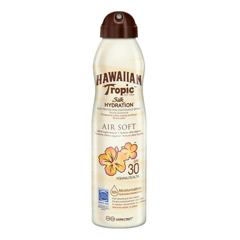 Hawaiian Tropic Silk Hydration Air Soft Sunscreen Mist SPF 30 in 177ml bottle, shown in a sunny outdoor setting.