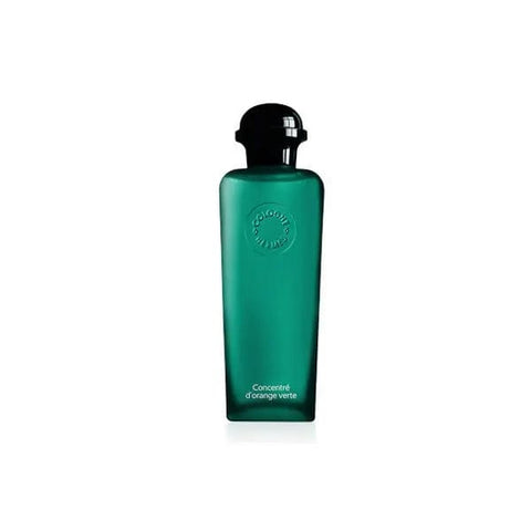 Hermes Concentre D'orange Verte Eau De Toilette spray 100ml with orange and citrus notes, held in a sleek glass bottle.