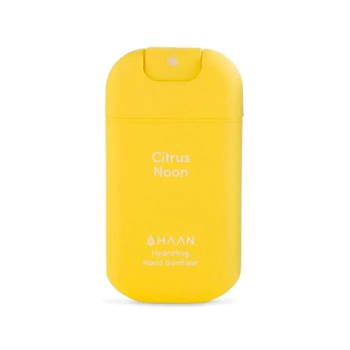 Hydrating hand sanitizer by Jag Couture London, Citrus Noon scent, 30ml bottle with clear liquid and flip-top cap.