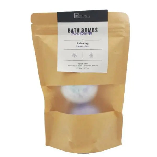Set of four IDC Institute Pure Energy bath bombs by Jag Couture London New York, colorful round bath bombs in a clear container.