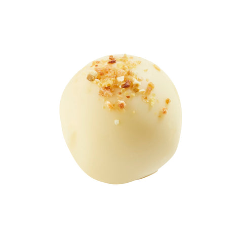 Ilvar white chocolate lemon cheesecake truffle from Jag Couture London, creamy filling in a 13.7g chocolate treat.