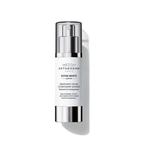 Institut Esthederm Esthe White Brightening Youth Anti Dark Spots Serum 30ml from Jag Couture London, shown in a sleek bottle.