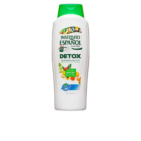 Instituto Español Detox Moisturizing Shower Gel 1250ml in a clear bottle with a blue and white label, displayed on a bathroom shelf.