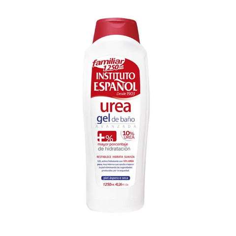 Instituto Español Urea Shower Gel 1250ml in a clear bottle with a blue label, displayed on a bathroom shelf.