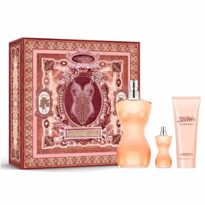 Set of three Jean Paul Gaultier Classique Eau De Toilette 100ml spray bottles, elegant perfume packaging with floral design.