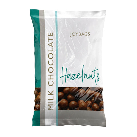 Milk chocolate-covered hazelnuts from Joybags by Jag Couture London New York, shown in a close-up image.