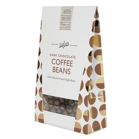 Jag Couture London - New York Joybox coffee beans coated in dark chocolate in a carton, showcasing glossy chocolate-coated coffee treats.