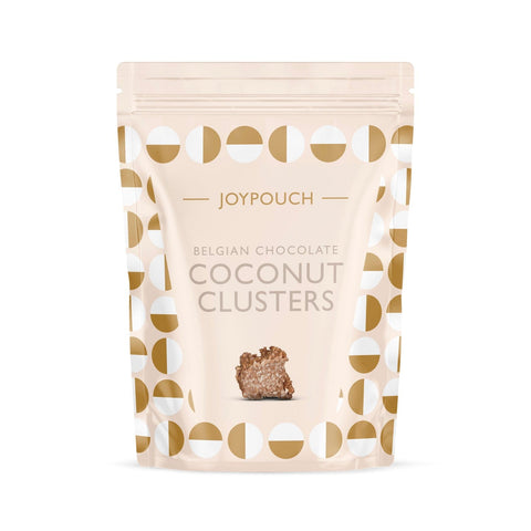 Milk chocolate-covered coconut clusters by Joypouch, crafted by Jag Couture London New York, shown in a close-up image.