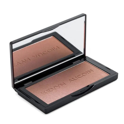 Kevyn Aucoin The Neo-Bronzer in Sunrise Light, a warm-toned bronzer from Jag Couture London New York, shown in a sleek compact.