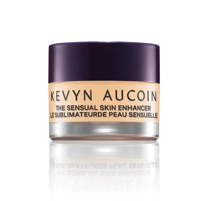 Kevyn Aucoin Sensual Skin Enhancer Concealer Sx 4 in a compact jar, showcasing smooth, creamy texture and skin-toned shade.