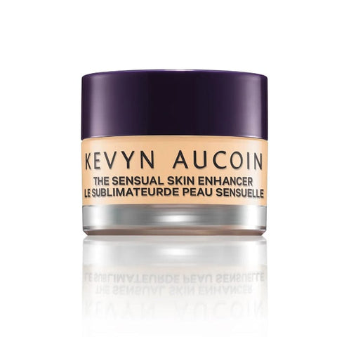 Kevyn Aucoin Sensual Skin Enhancer Concealer Sx 4, close-up of the makeup product in sleek packaging with smooth skin finish