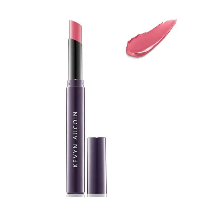 Kevyn Aucoin Unforgettable Lipstick Shine in Belle Of The Ball, with the tube showing vibrant pink shade and glossy finish.