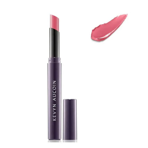 Kevyn Aucoin Unforgettable Lipstick Shine in Belle Of The Ball, with the tube showing vibrant pink shade and glossy finish.