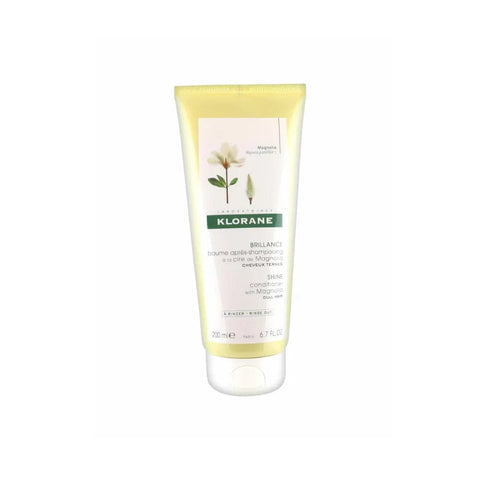 Klorane Magnolia Balm 150ml jar with creamy texture, displayed on a neutral background, showcasing the skincare product.
