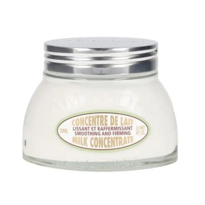 L'Occitane Almond Milk Concentrate 200ml bottle with almond illustrations, displayed on a clean white background.