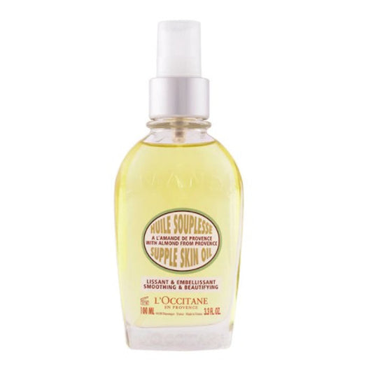 Jag Couture London almond skin oil in 100ml bottle, featuring a sleek design and the L'Occitane Supple Skin Oil label.