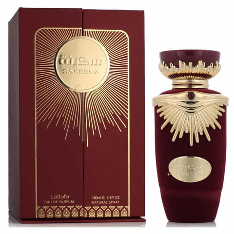 Jag Couture London Sakeena Eau de Parfum spray, 100ml, featuring elegant glass bottle with gold accents and floral fragrance details.