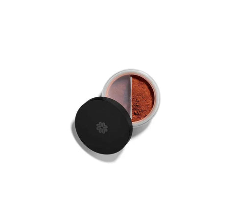 Lily Lolo Mineral Foundation Base in Bonbon with SPF 15, from Jag Couture London New York, displayed in a compact with a beige shade.