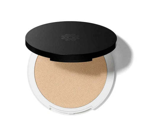 Lily Lolo Mineral Illuminator in Champagne by Jag Couture London New York, showcasing the shimmering powder compact.