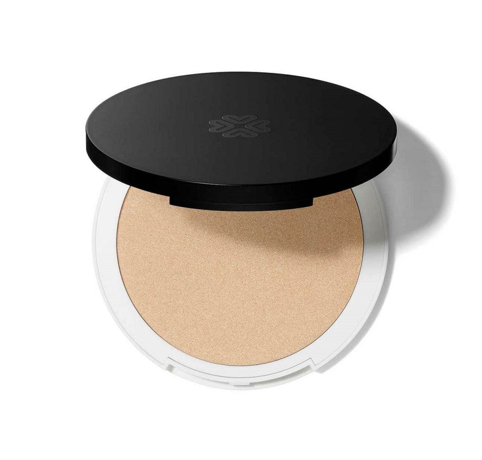 Lily Lolo Mineral Illuminator Champagne by Jag Couture London New York, featuring a compact mineral highlighter with a shimmering finish.