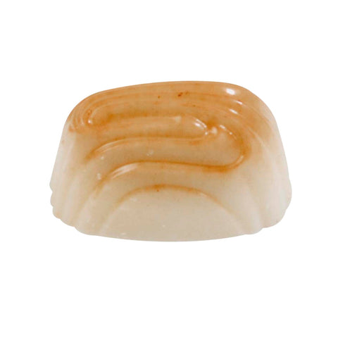 Lucas coconut cream in white chocolate by Jag Couture London, 13.8g, shown in a sleek, rectangular packaging with white chocolate coating.