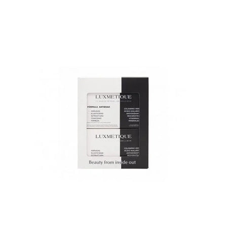 Luxmetique Proage Day Formula drinkable vials by Jag Couture London - New York, featuring clear glass vials with liquid contents.