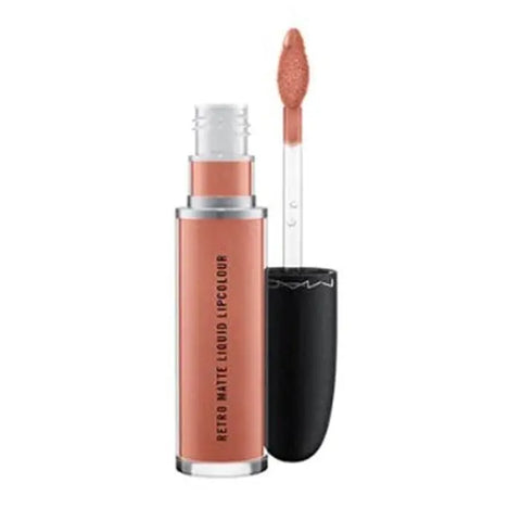 Jag Couture London New York Mac Retro Matte Liquid Lipcolour Metallics Quartzette tube with metallic finish and applicator brush visible.