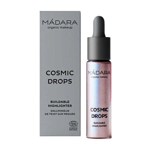 Mádara Cosmic Drops Aurora Borealis illuminating serum in 13.5ml bottle with iridescent packaging, natural skincare product.