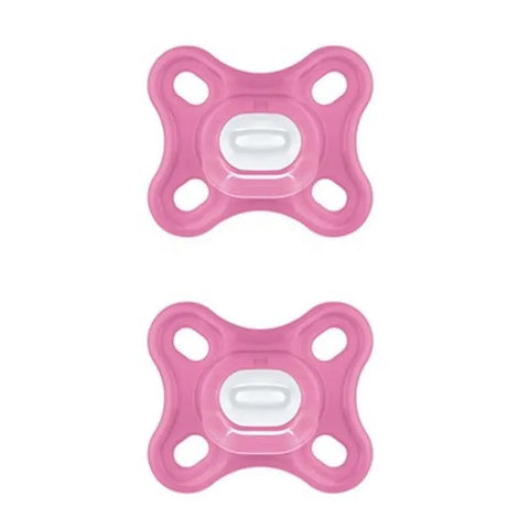 Two pink Mam Comfort pacifiers made of 100% silicone with sterilizing box, for infant soothing and comfort.