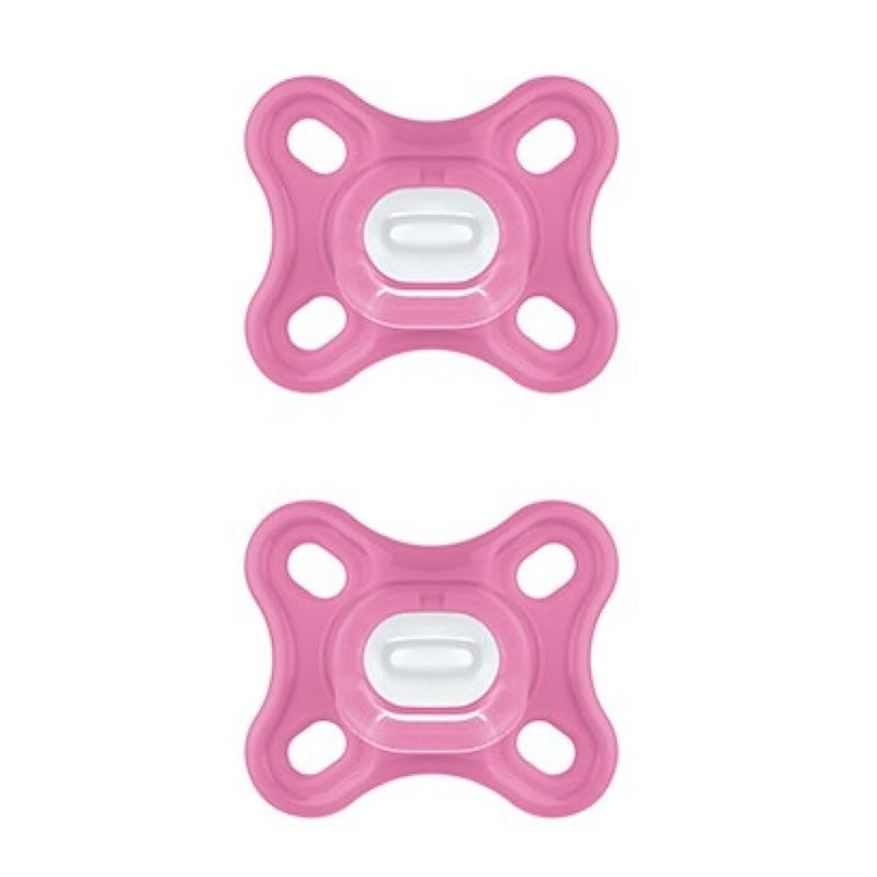 Two pink Mam Comfort silicone pacifiers with sterilizing box, designed for babies, from Jag Couture London - New York.