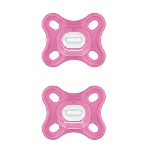 Two pink Mam Comfort silicone pacifiers with sterilizing box, designed for babies, from Jag Couture London - New York.