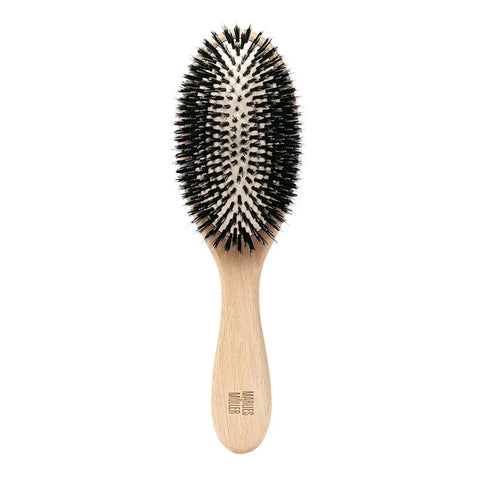 Marlies Moller Allround Hair Travel Brush by Jag Couture London New York, compact hairbrush with wooden handle and bristles.
