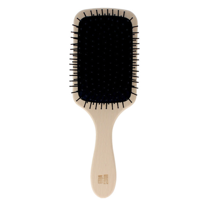 Marlies Moller New Classic Brush by Jag Couture London - New York, close-up of a professional hairbrush with wooden handle and bristles.
