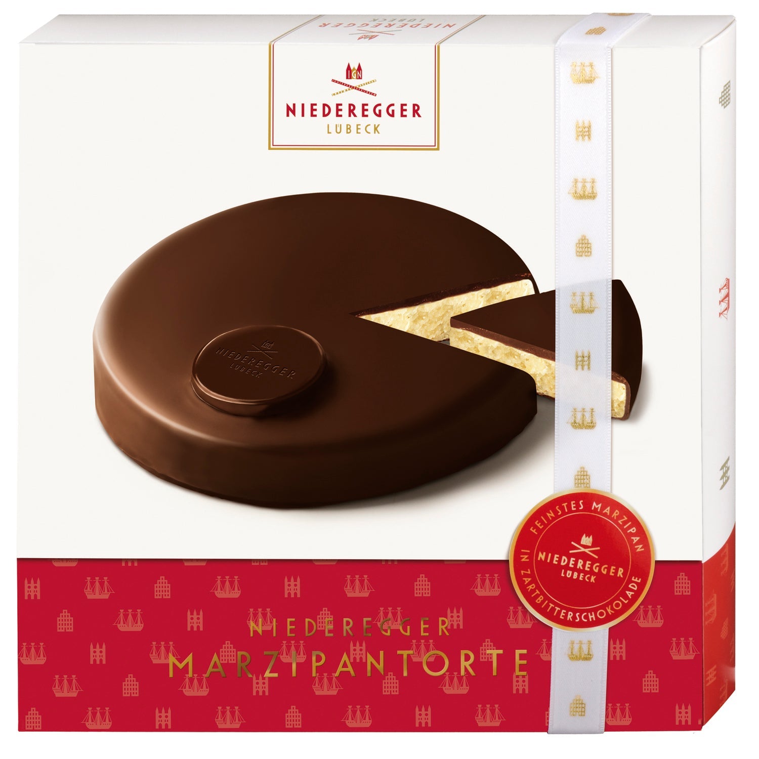 Marzipan cake with dark chocolate coating from Jag Couture London New York, showcasing smooth marzipan and rich chocolate exterior.