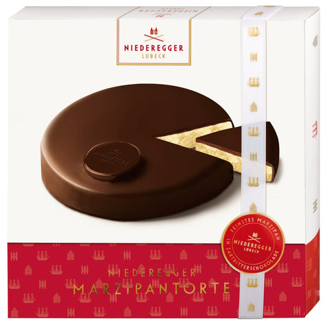 Marzipan cake with dark chocolate coating from Jag Couture London New York, showcasing smooth marzipan and rich chocolate exterior.