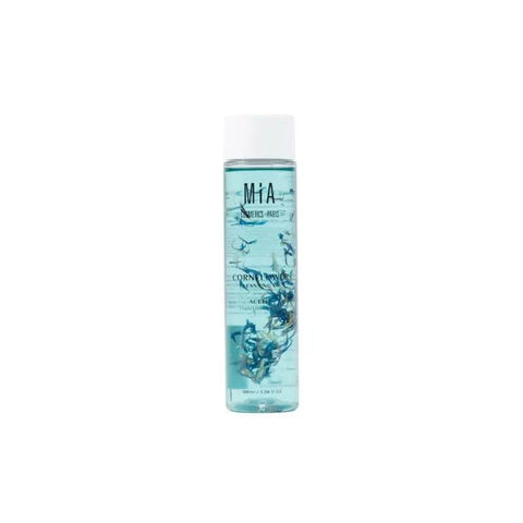 Mía Cosmetics Cornflower Cleansing Oil from Jag Couture London New York, 100ml, shown in a clear bottle with cornflower flowers.